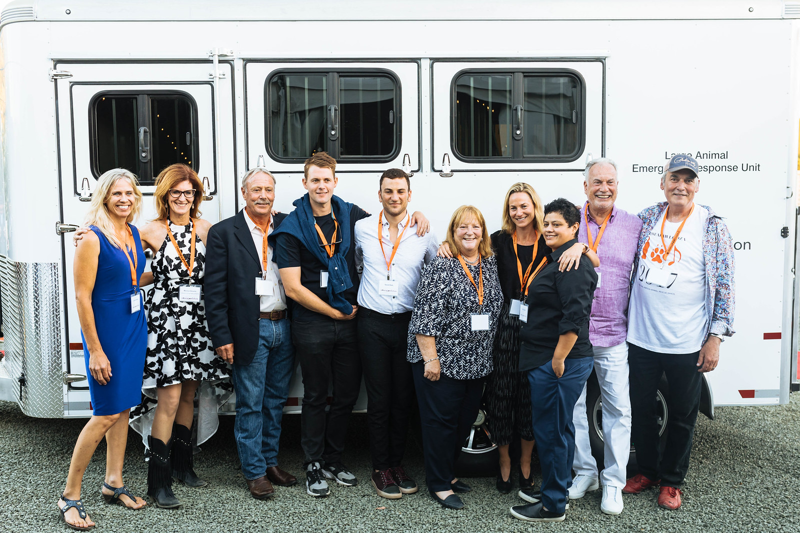 Group photo: The Roth Family surrounded by Monica and David Stevens and industry leaders, WineaPAWlooza, 2017